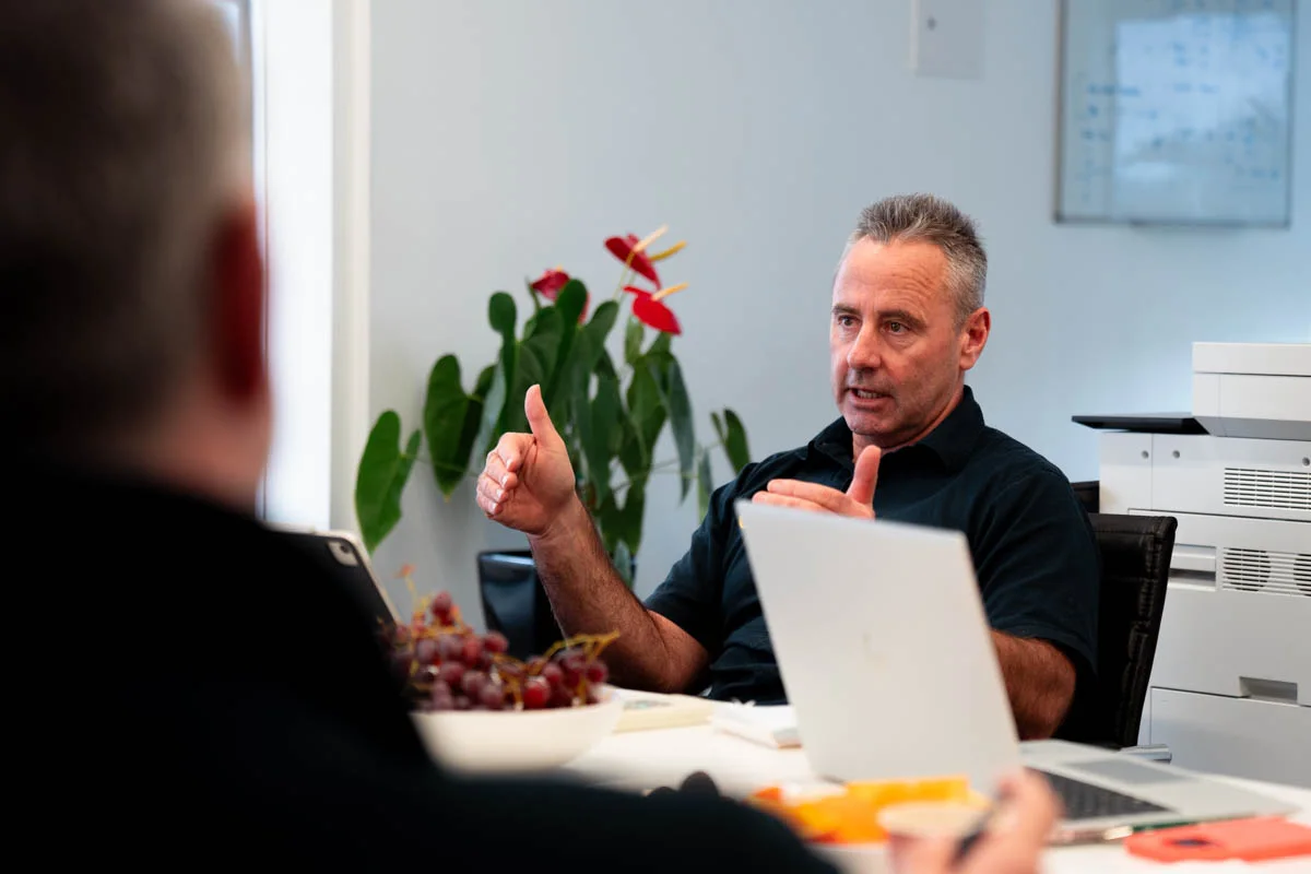 A Connect Group leader making a point in a boardroom session